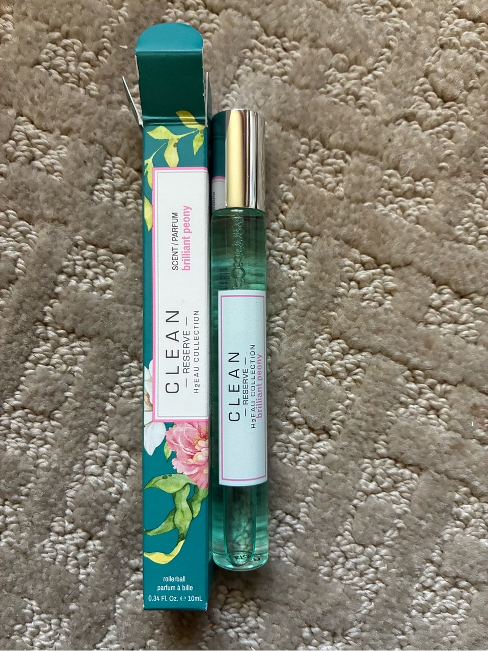 Clean Reserve rollerball 10ml in brilliant peony